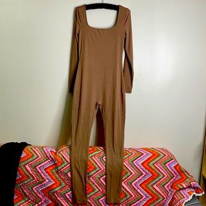Black and brown brand new jumpsuit never worn size medium